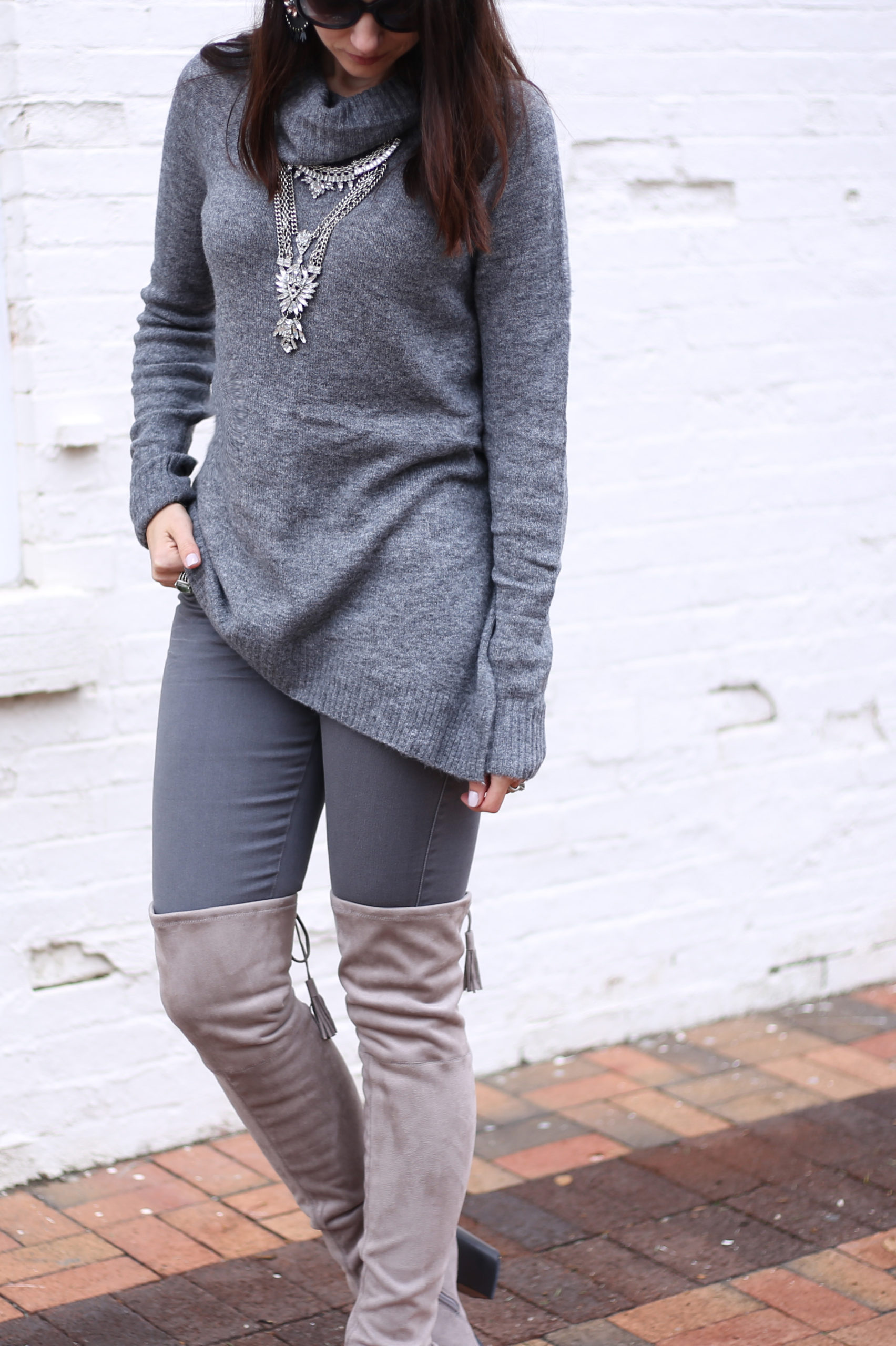 blogger Anna Monteiro of Blushing ROse Style wearing LOFT faur fur vest and Mrac Fisher over the knee alinda boots in grey