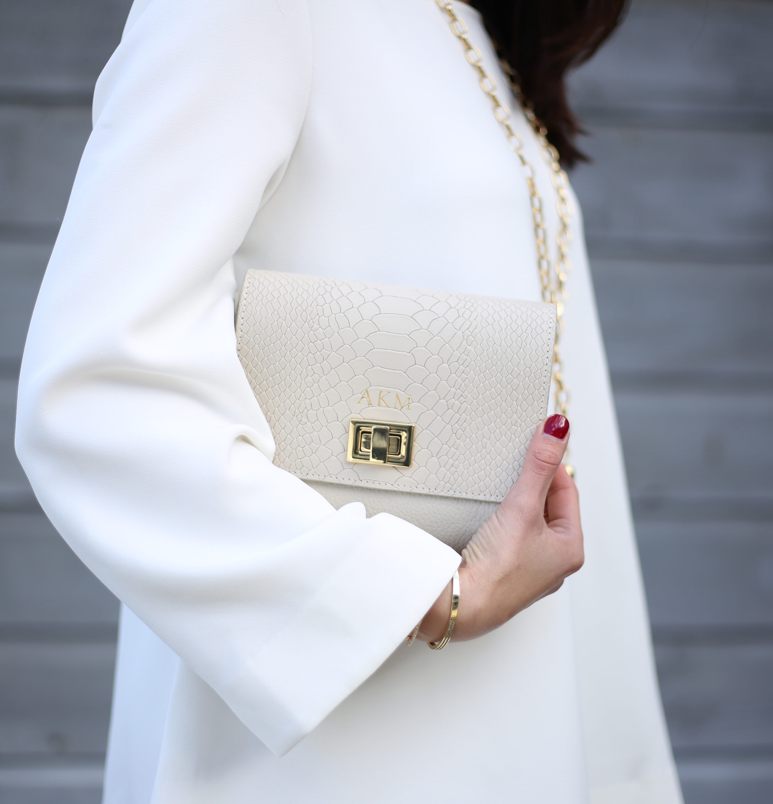 lifestyle blogger Anna Monteiro of blushingrosestyle wearing Alfani white structured blouse and GiGi New York Catie bag in this Office Holiday party look