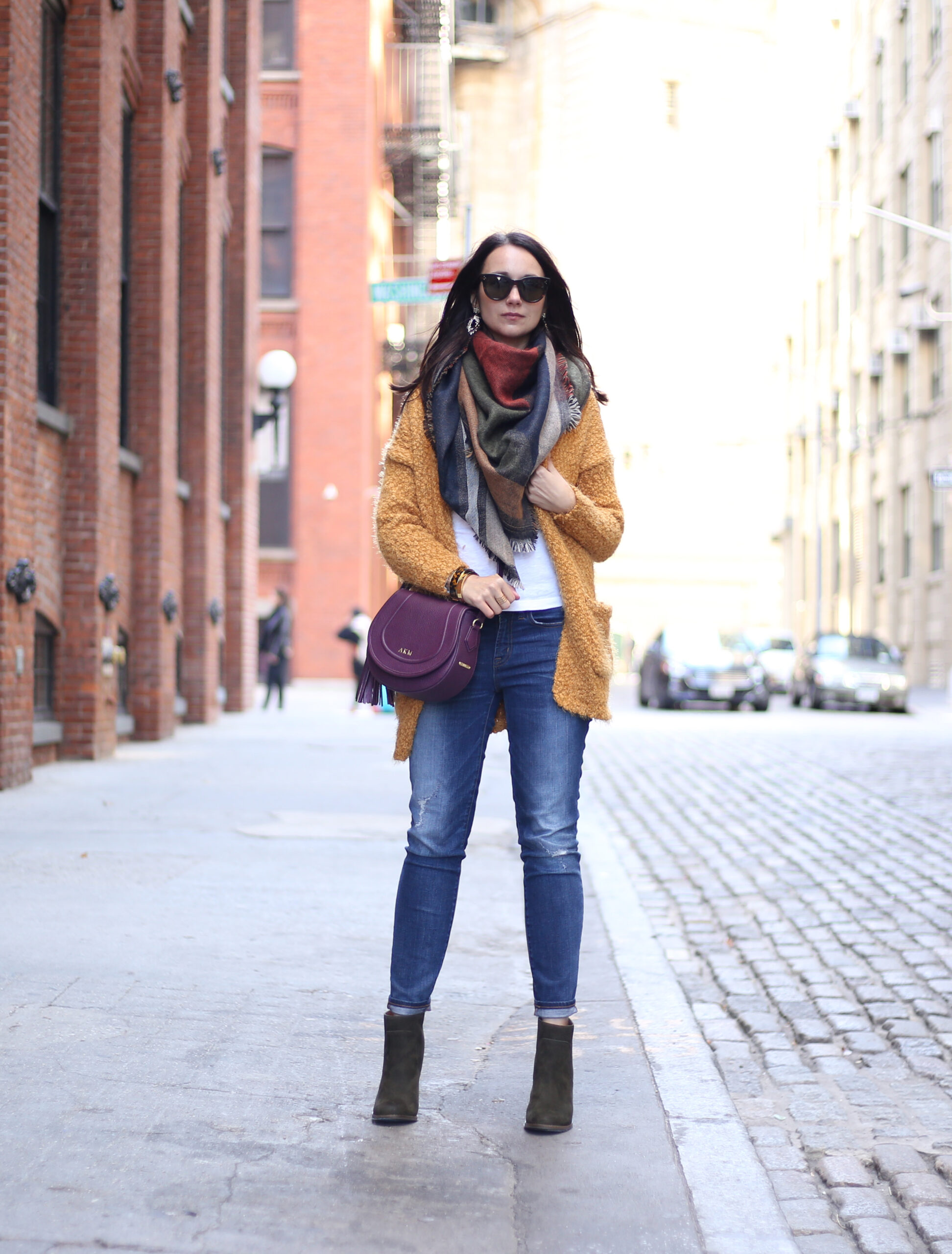 blogger Anna Monteiro of blushing rose style blog wearing mustard yellow open front cardigan and BP geometric blanket scarf from nordstrom