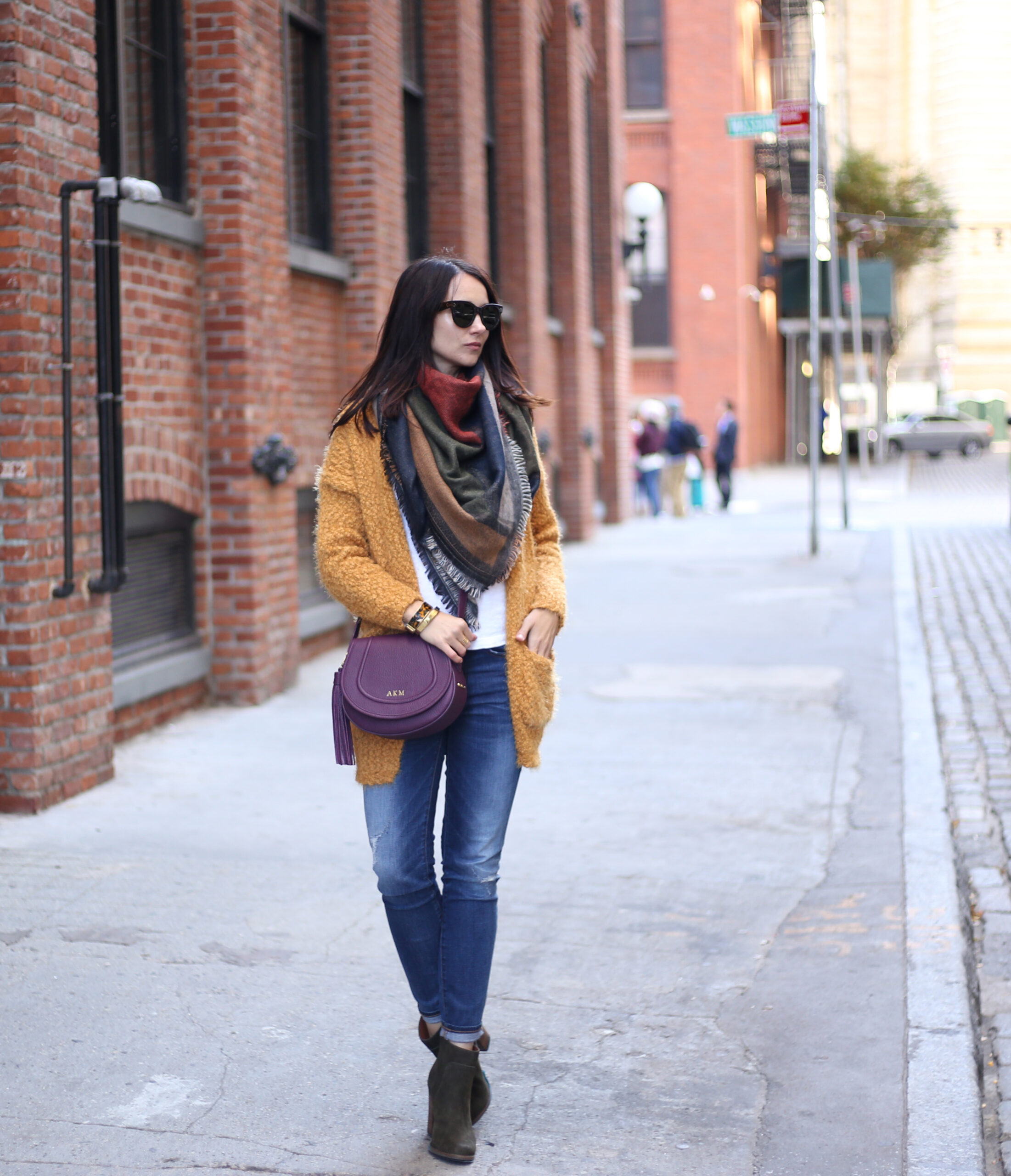 fashion blogger Anna Monteiro of blushing rose style blog wearing yellow open front cardign, BP scarf from Nordstrom and a gigi new york bag