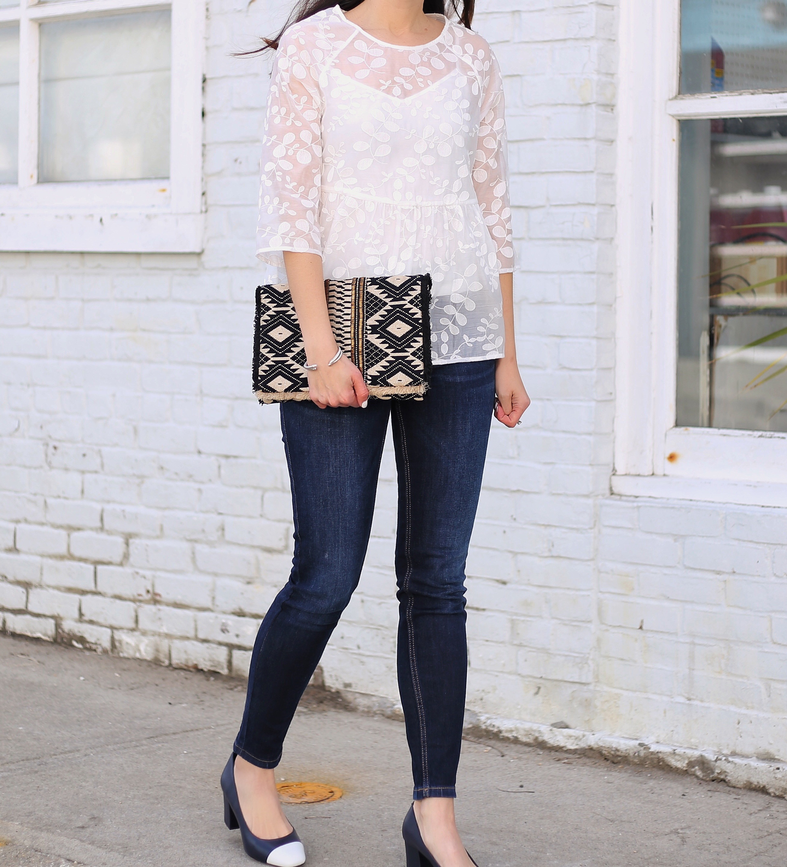 Anna Monteiro of blushing rose style blog wearing white peplum top from marks & spencer