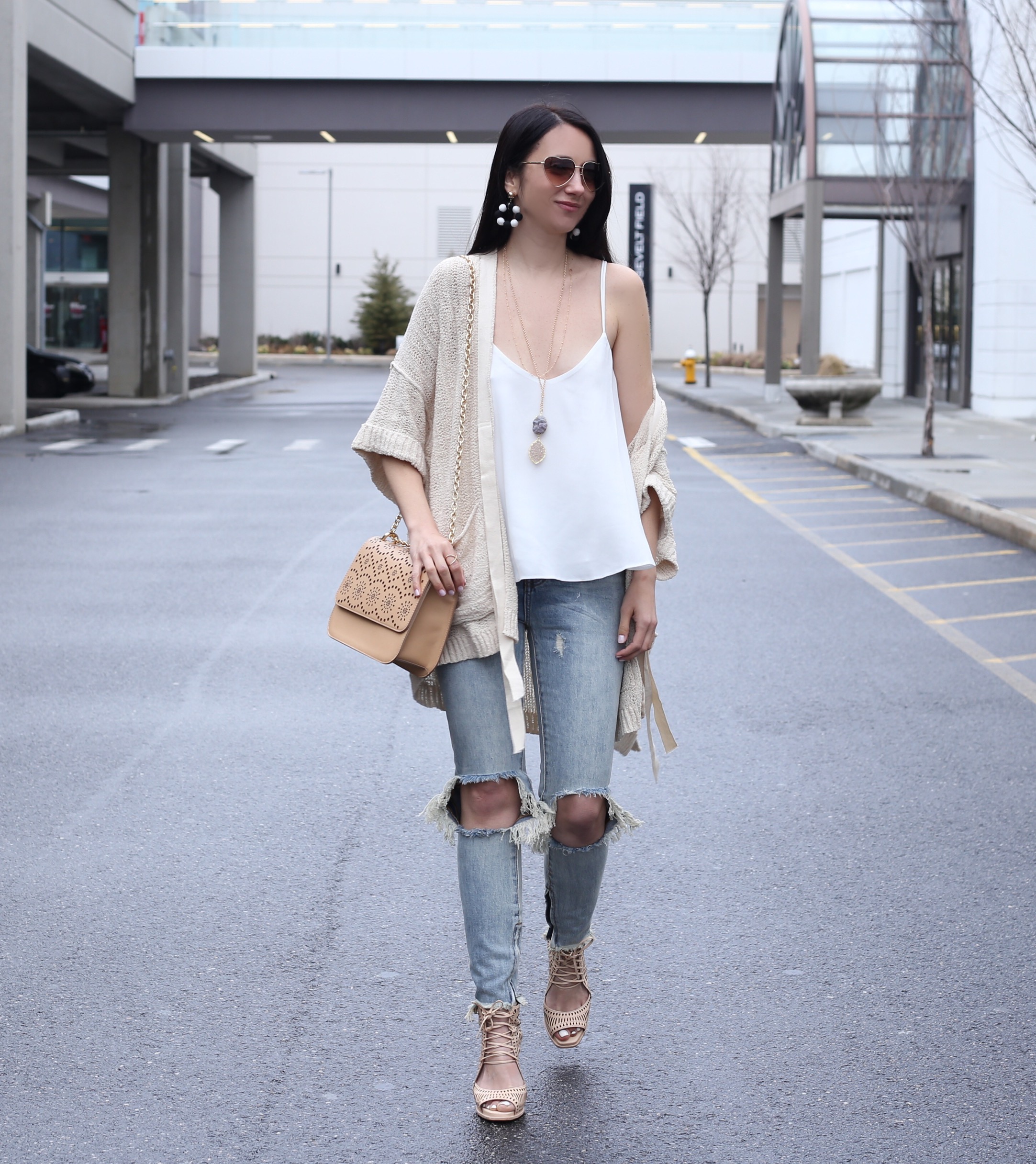 fashion blogger Anna Monteiro of Blushing Rose Style wearing free people beach cardigan and jeffrey campbell wedges