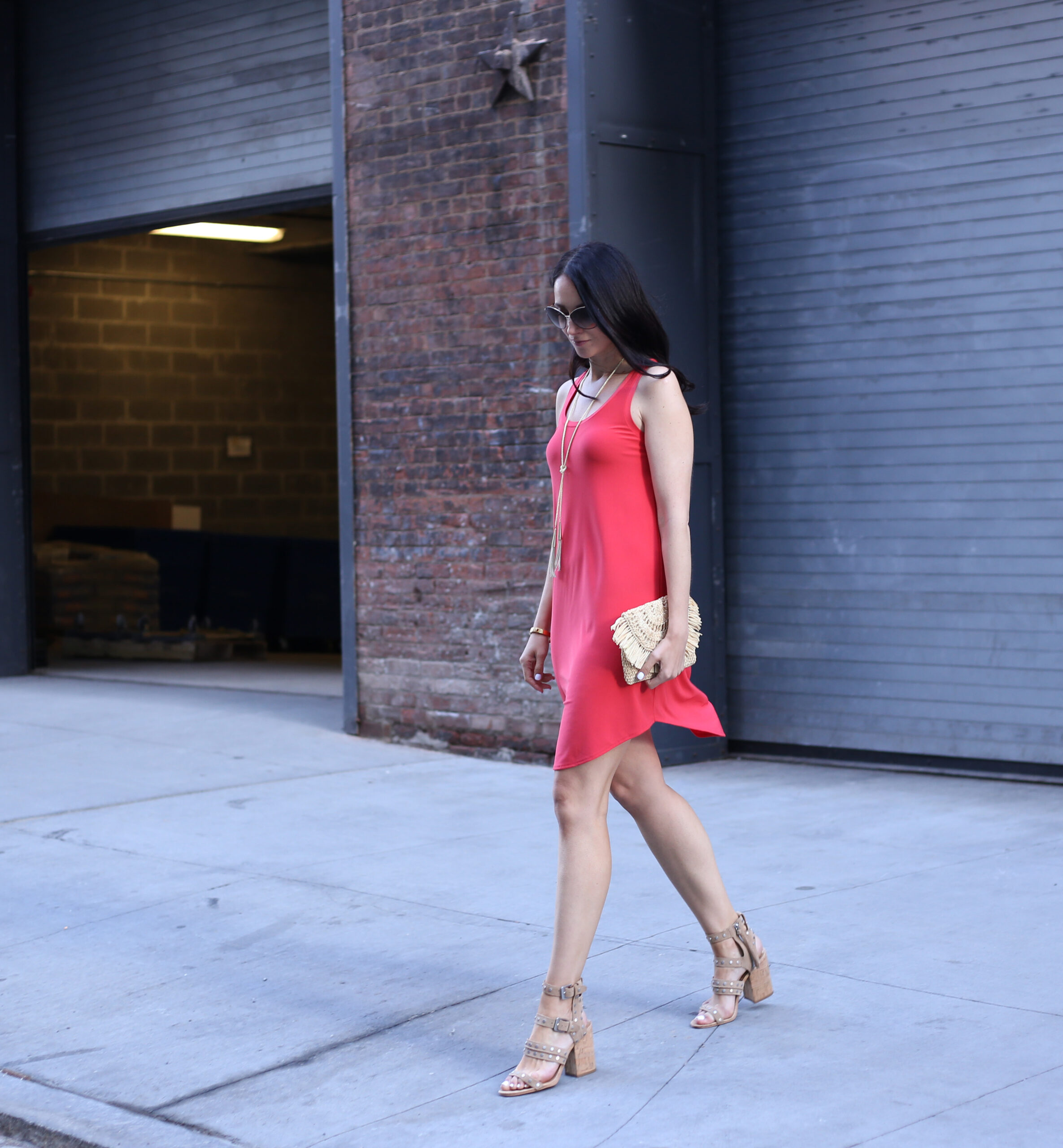 blogger Anna Monteiro of blushing rose style blog wearing leith red tank dress and marysol straw clutch