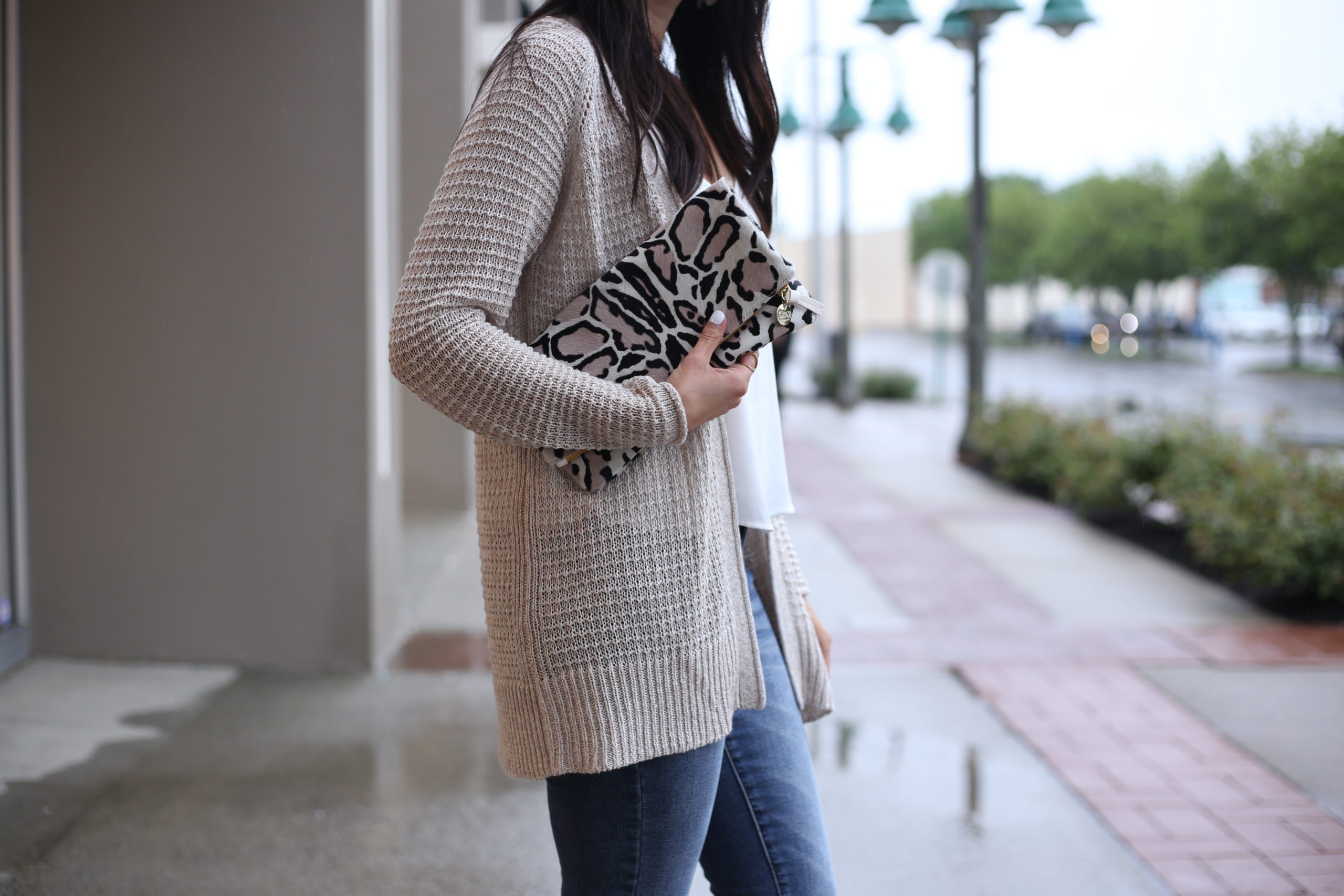 Anna Monteiro wearing a clare v clutch from nordstrom with leopard print