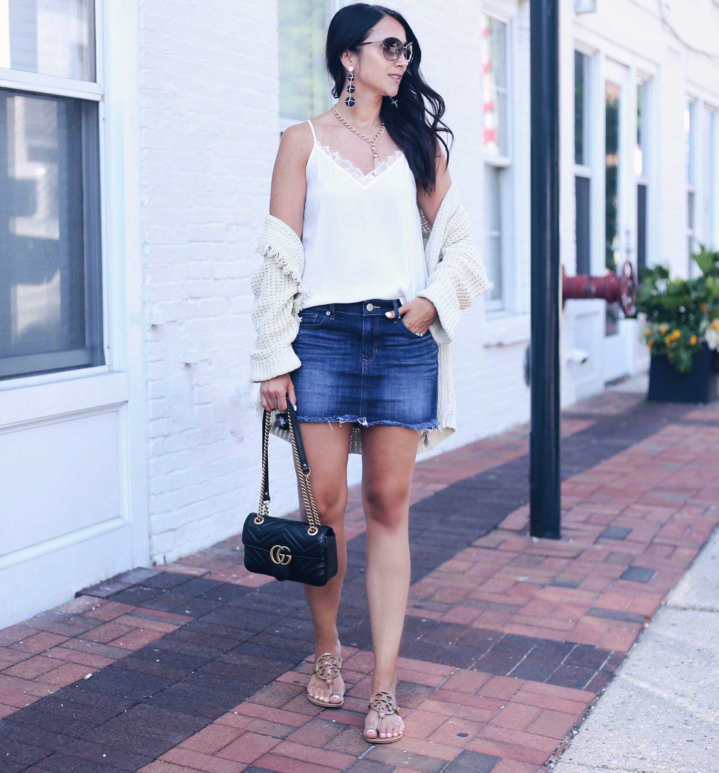 blogger Anna Monteiro of Blushing Rose Style wearing denim mini skirt from Express and Lush lace trim camisole from Nordstrom Anniversary sale 2017