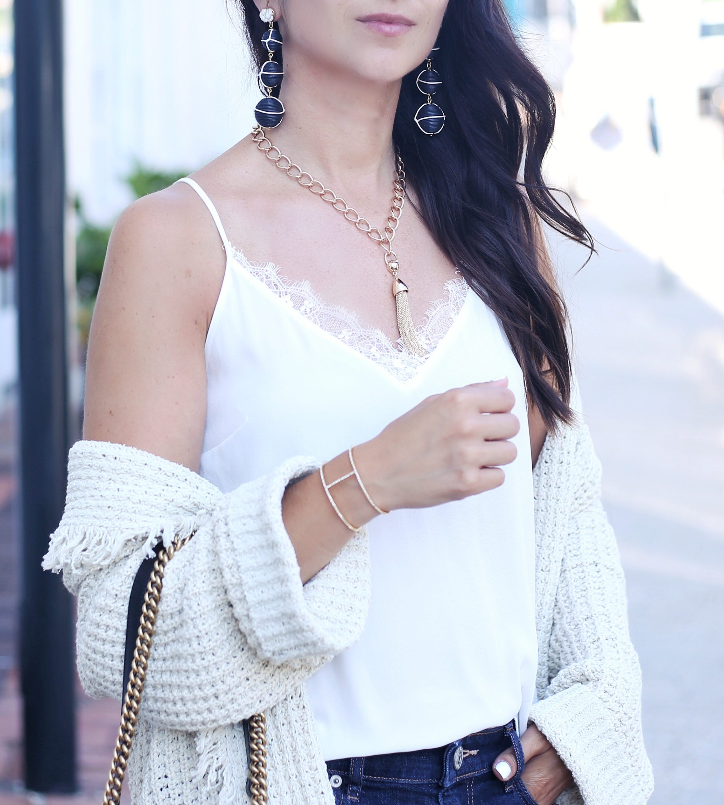 blogger Anna Monteiro of blushing rose style blog wearing babublebar drop earrings and tassel necklace