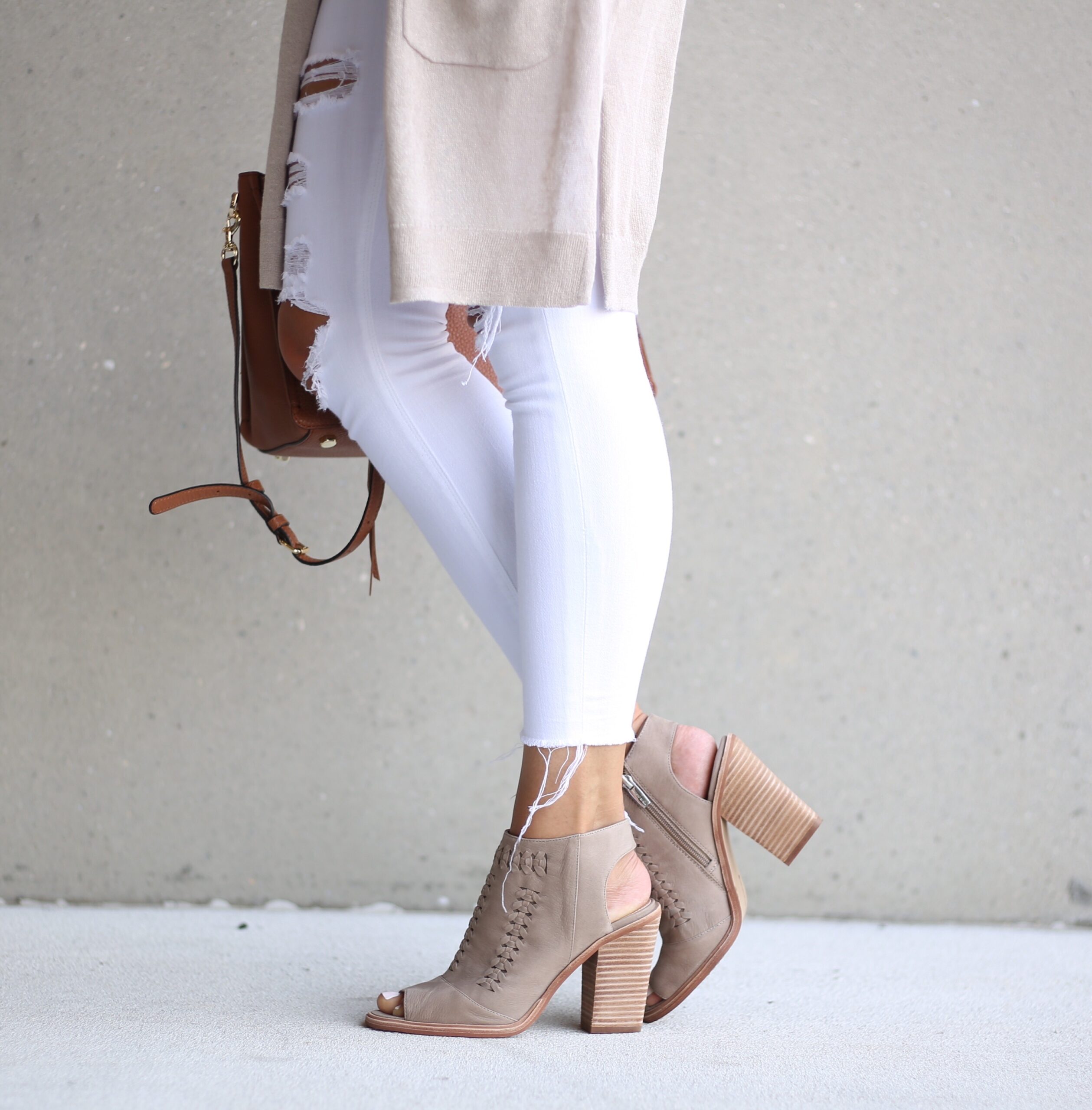 blogger Anna Monteiro of Blushing Rose Style wearing Vince Kamuto booties