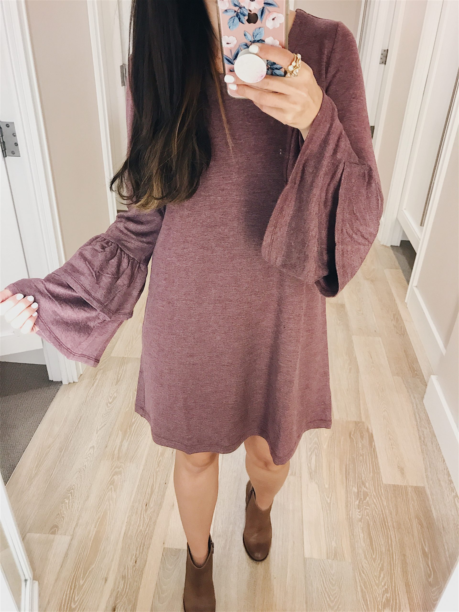 Anna Monteiro of Blushing Rose STyle blog wearing cute fall outfit: dress with bell sleeves and booties