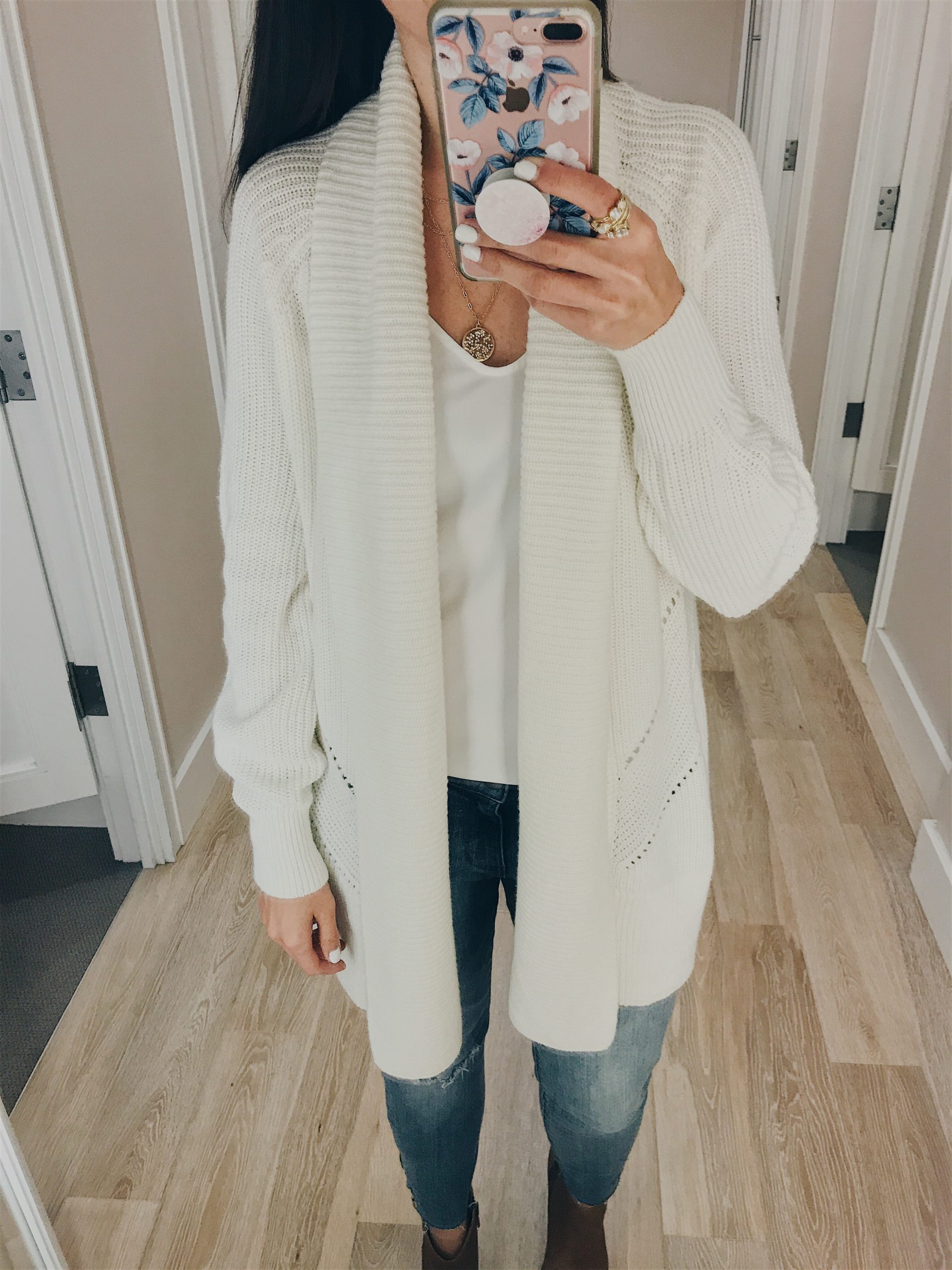 Anna Monteiro of Blushing Rose Style wearing cozy and chunky white cardigan in fall outfit