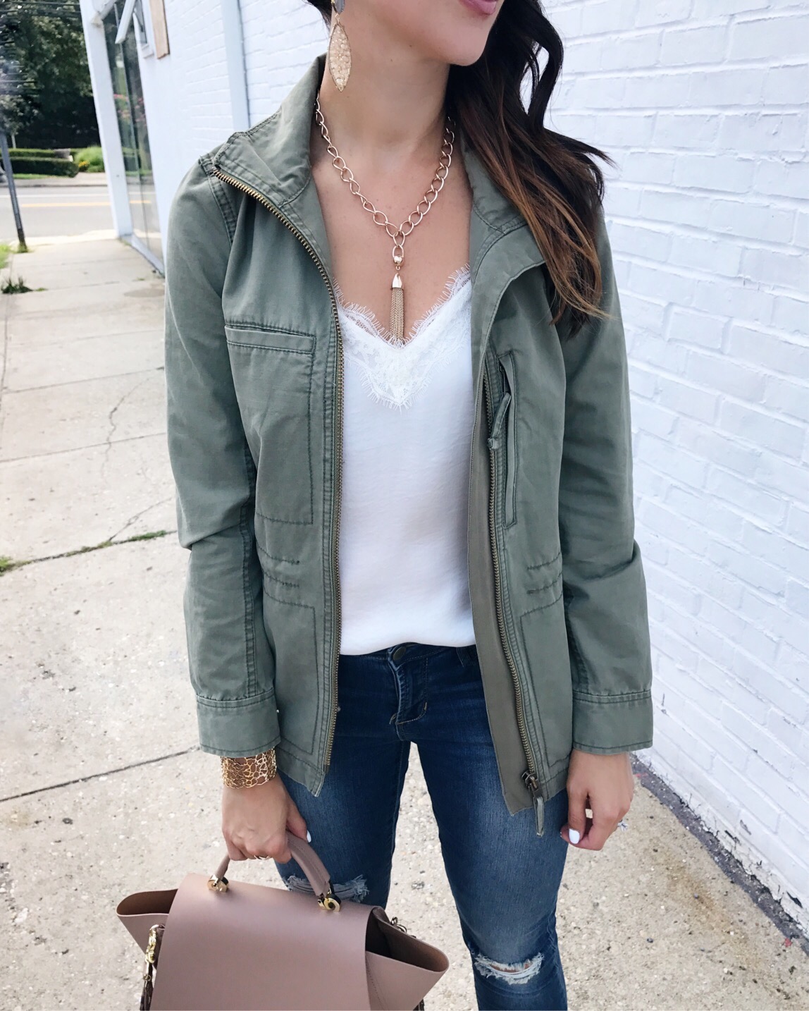 blogger Anna Monteiro of Blushing Rose Style blog wearing madewell utility jacket from shopbop sale