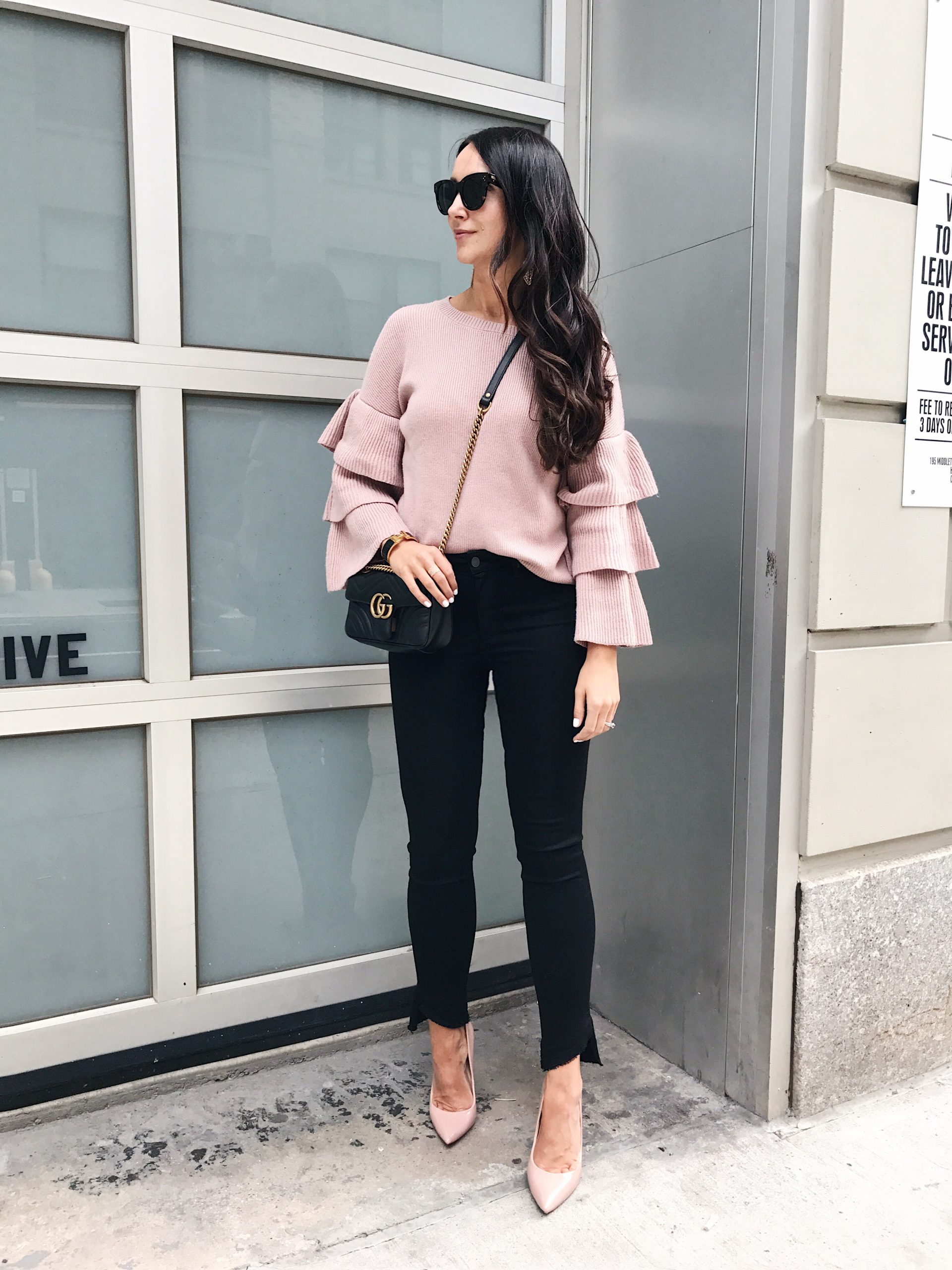 blogger Anna Monteiro wearing paige denim and pink halogen ruffle sleeve pullover in great pair of jeans posy