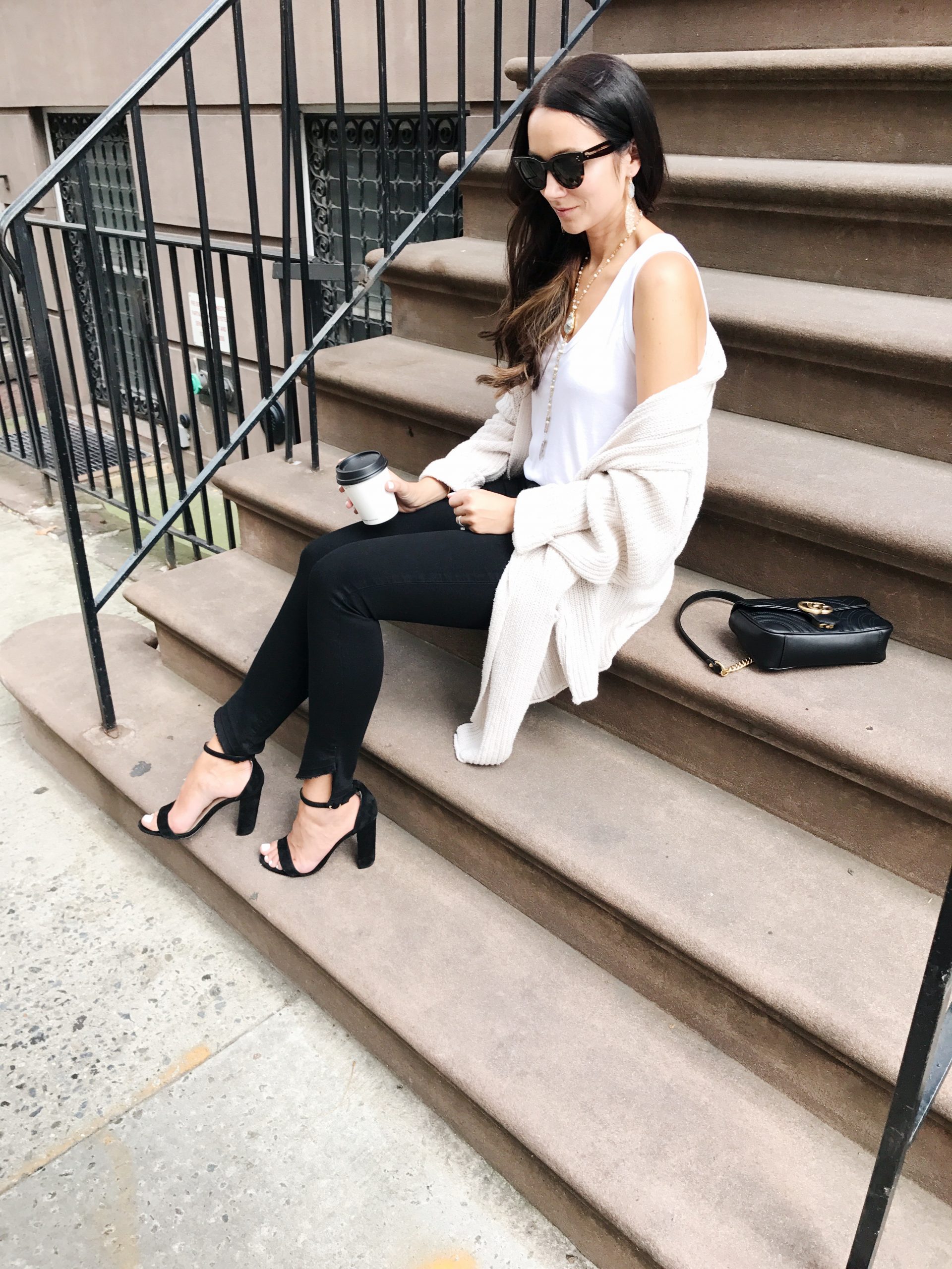 blogger Anna Monteiro of Blushing Rose Style blog wearing Steve Madden block heel sandals and great pair of jeans