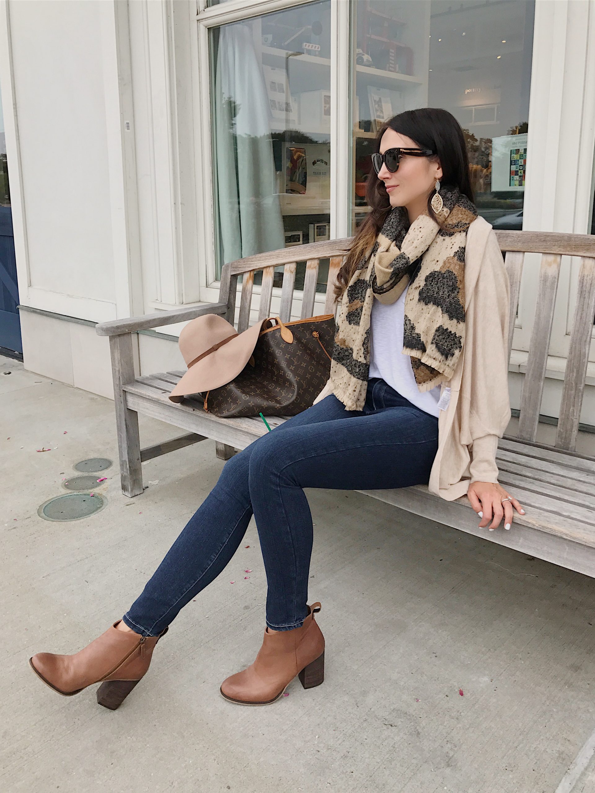 blogger Anna Monteiro of blushing rose style blog wearing skinny jeans by paige denim and BP booties from Nordstrom