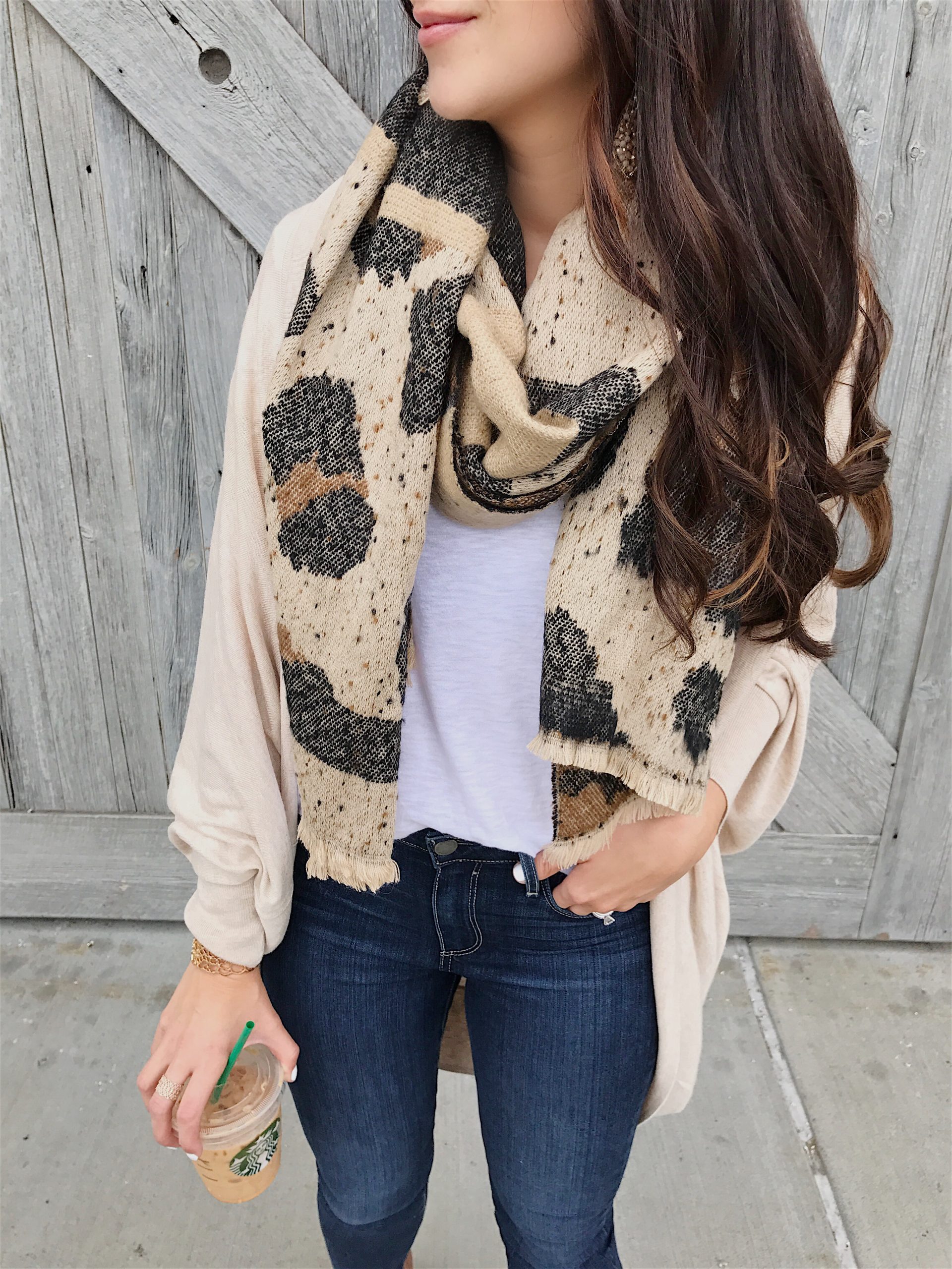 blogger Anna Monteiro of blushing rose style blog wearing paige denim jeans from nordstrom and bp mixed leopard print scarf