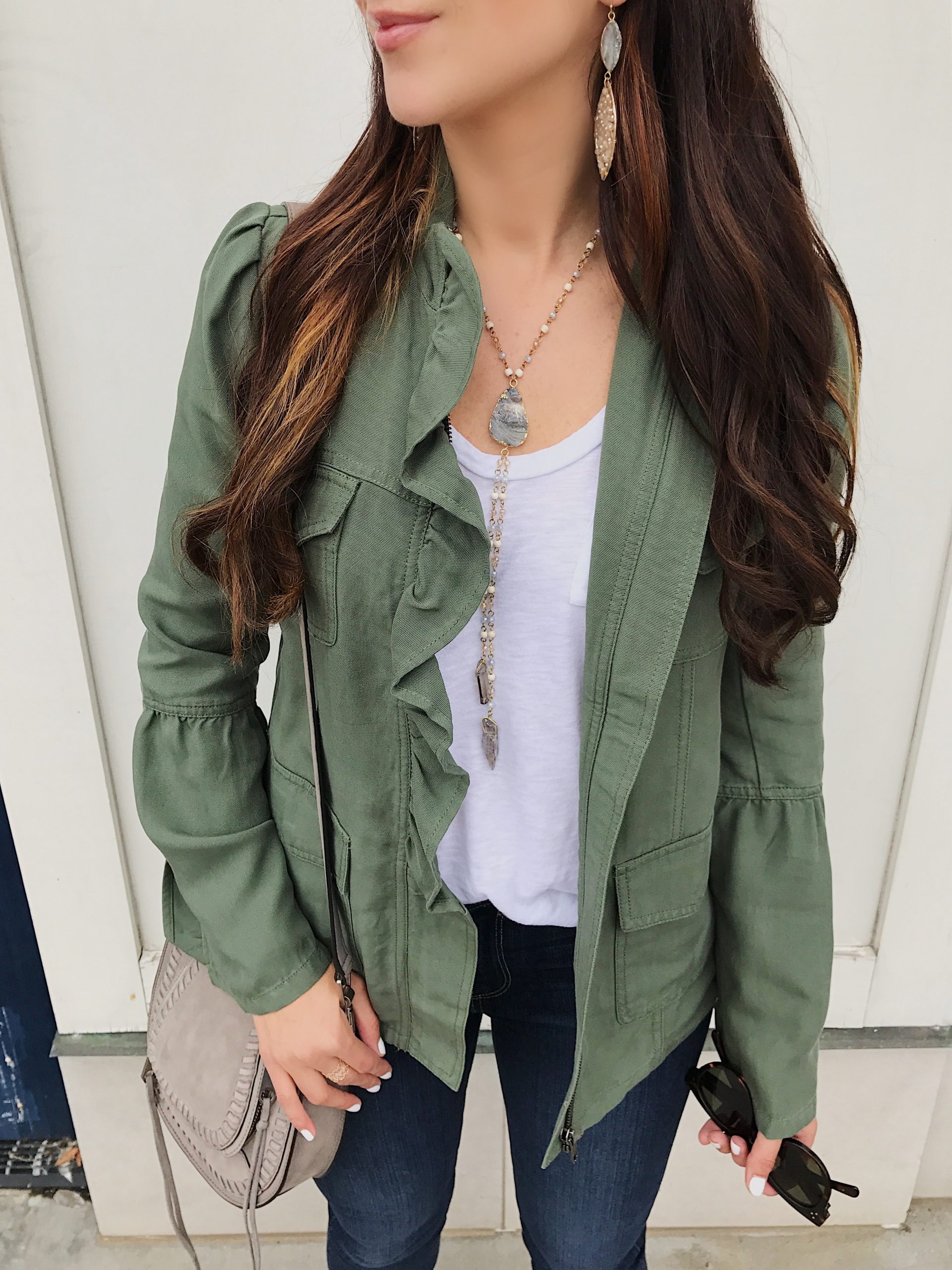 blogger Anna Monteiro of Blushing Rose Style wearing halogen ruffle utility jacket from nordstrom