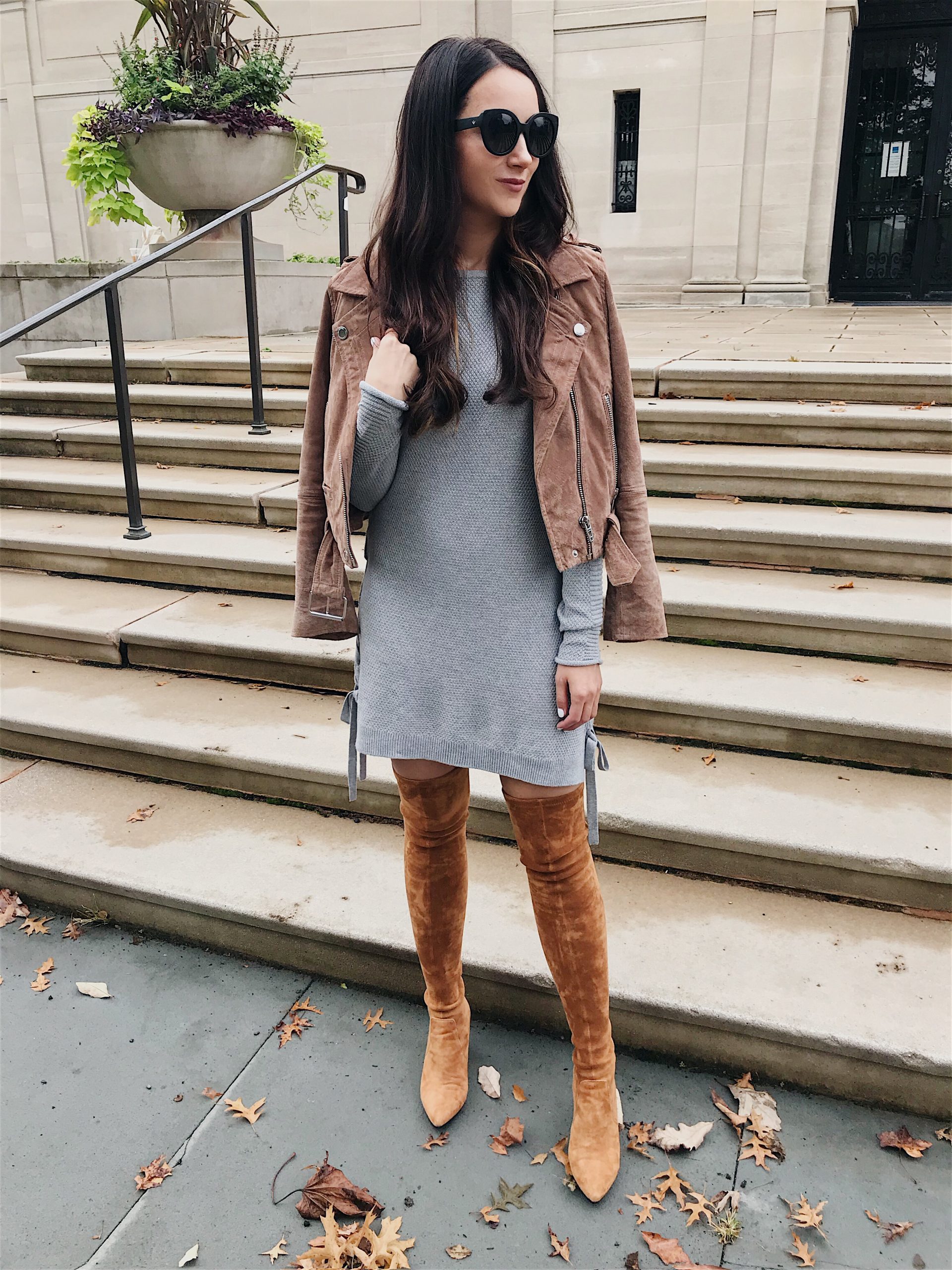 Blushing Rose Style blog wearing grey sweater dress with brown over the knee boots and suede moto jacket in tunic top styled 3 ways