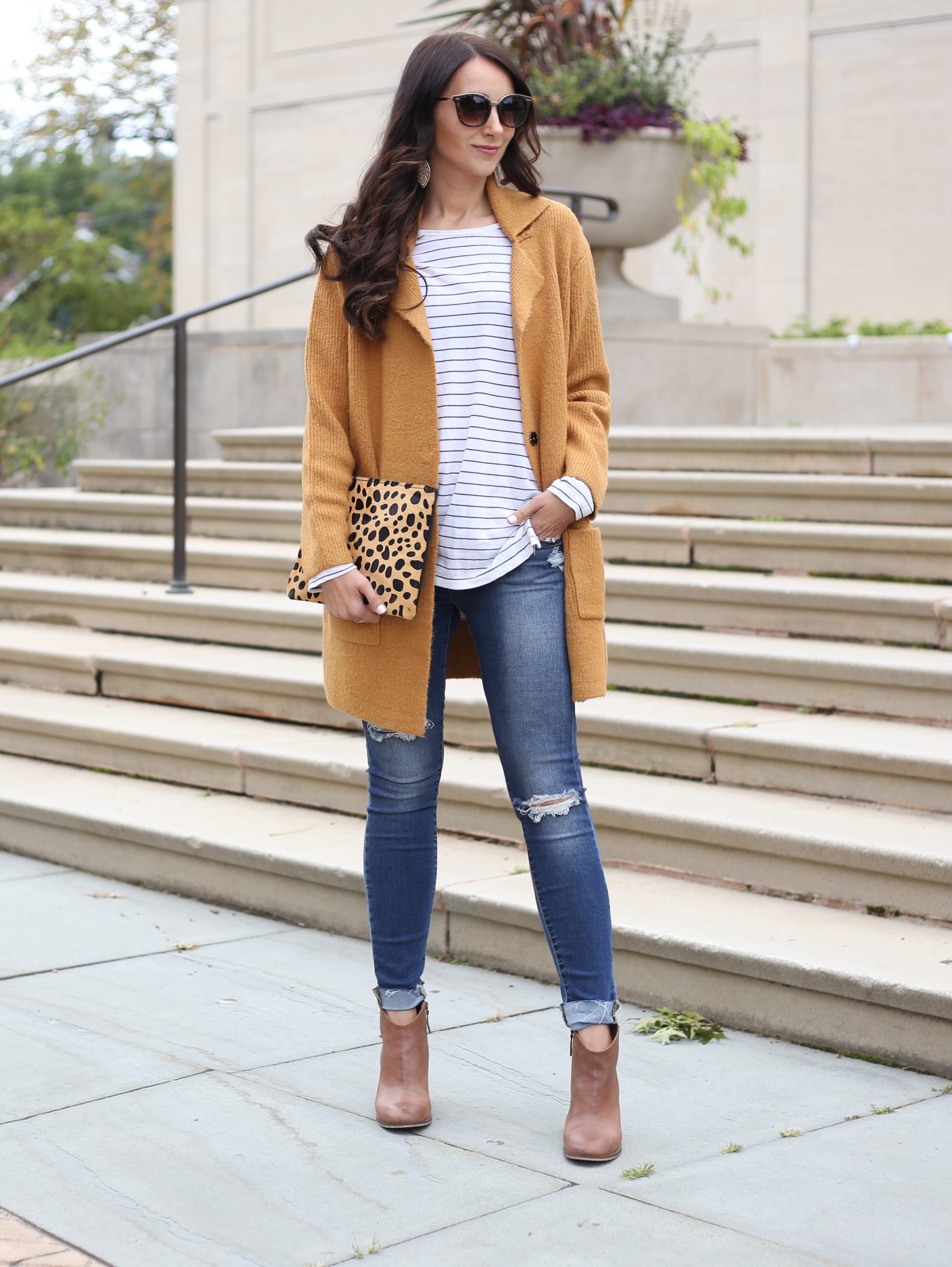 blogger Anna Monteiro of Blushing Rose Style wearing cozy fall sweaters