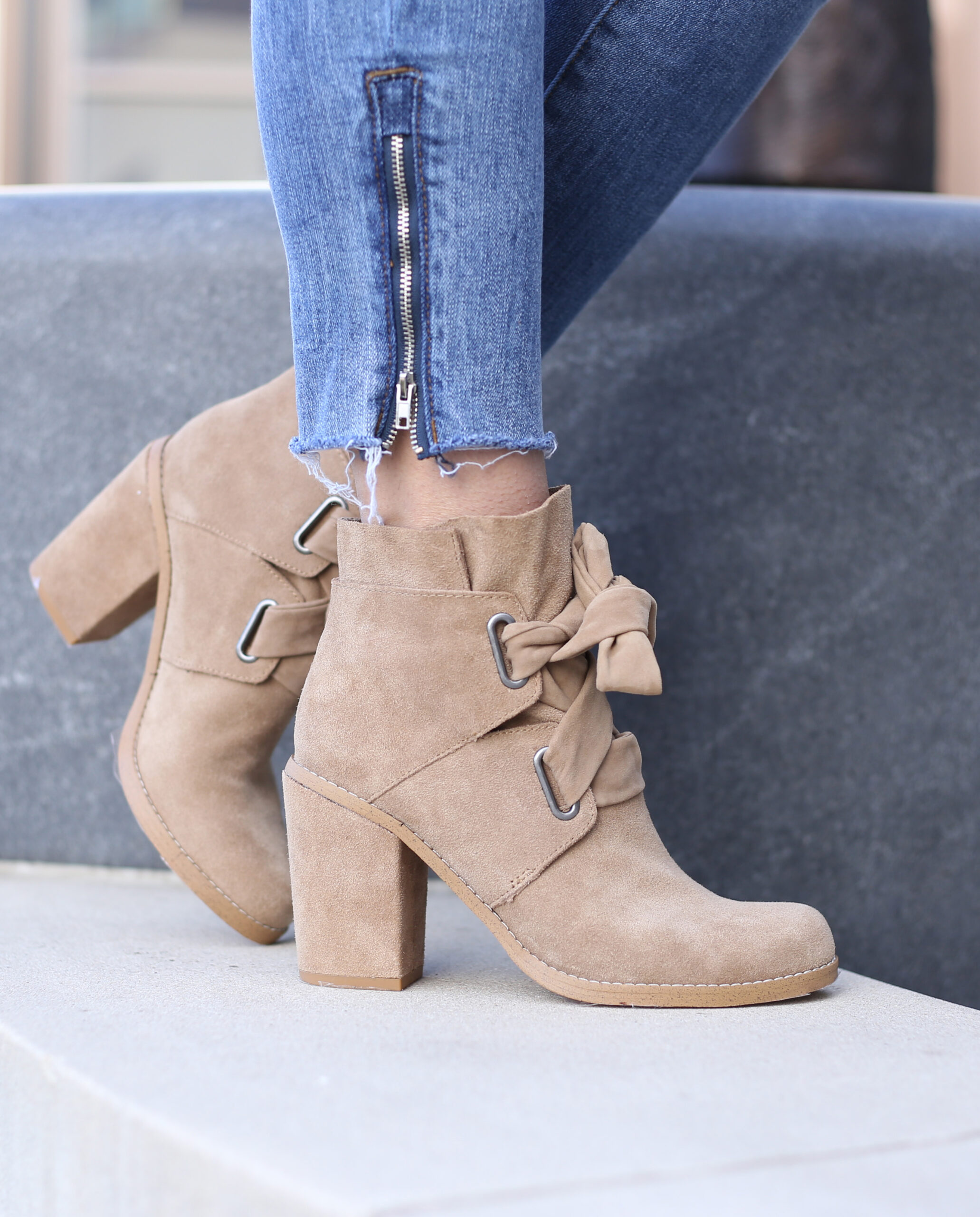 anna monteiro of blushing rose style wearing fall booties , lace up taupe booties, block heel booties