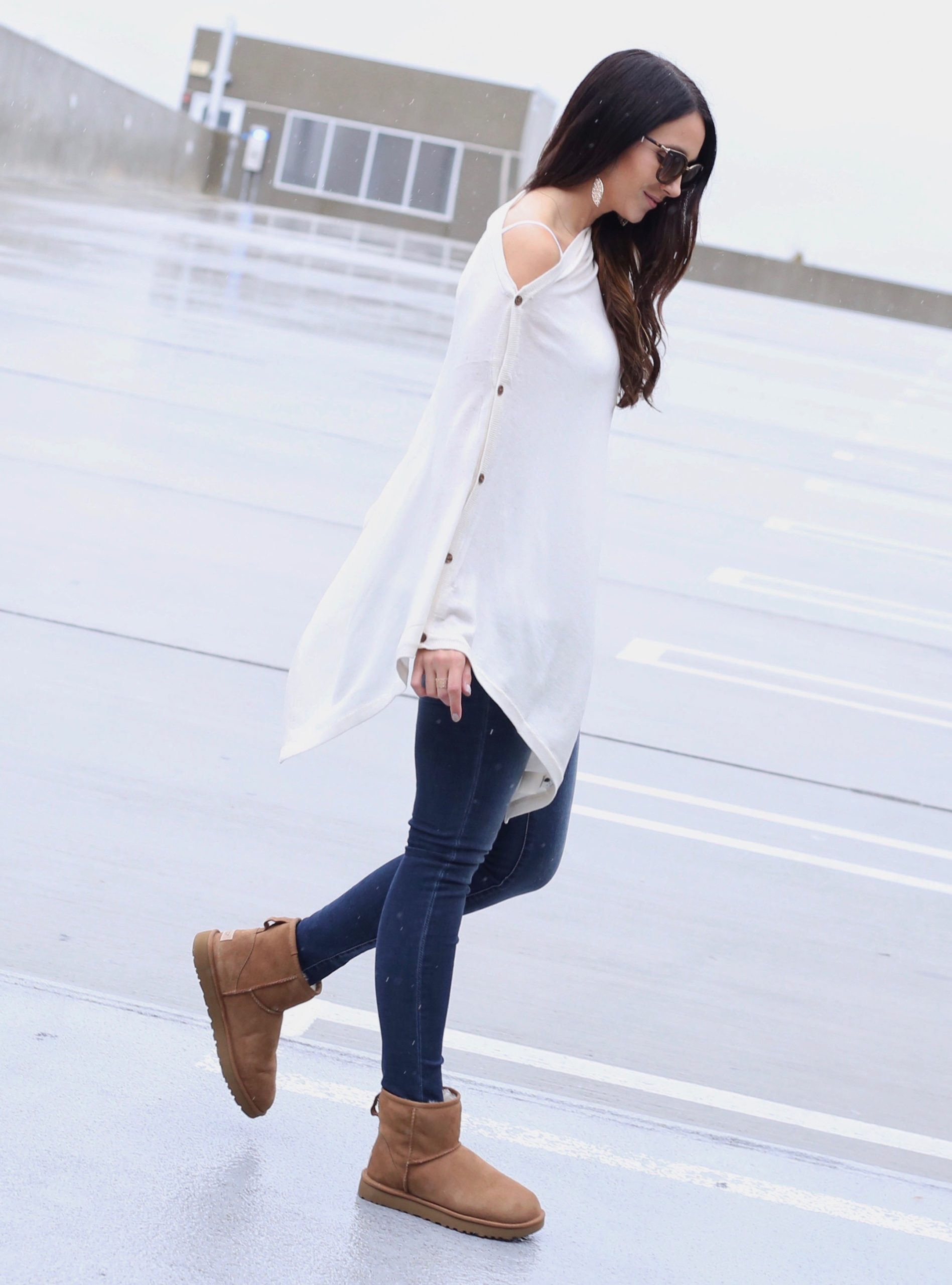 anna monteiro of blushing rose style blog wearing casual fall outfit poncho skinny jeans and uggs in ugg season