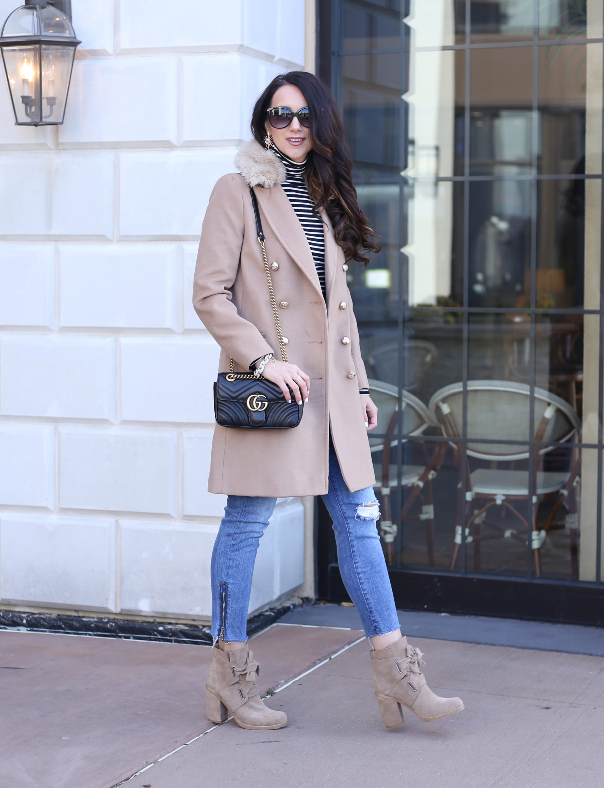 anna monteiro of blushing rose style blog wearing camel coat, faux fur collar coat and booties with block heels