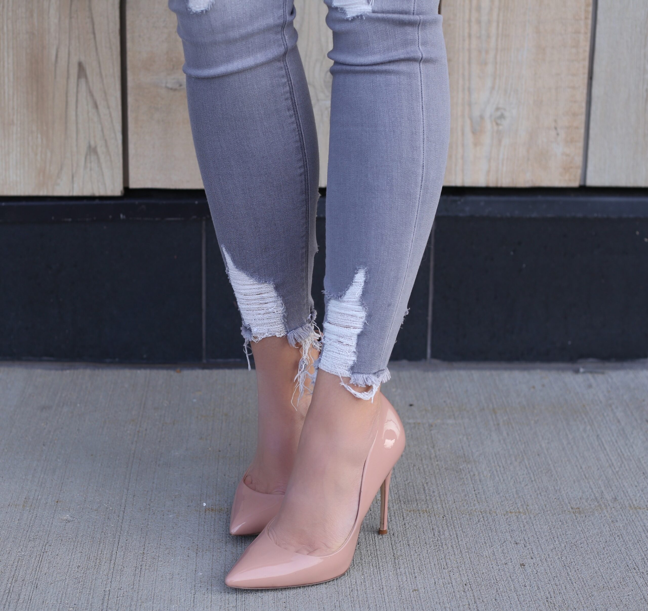 distressed grey denim and nude blush pumps great for holiday outfit