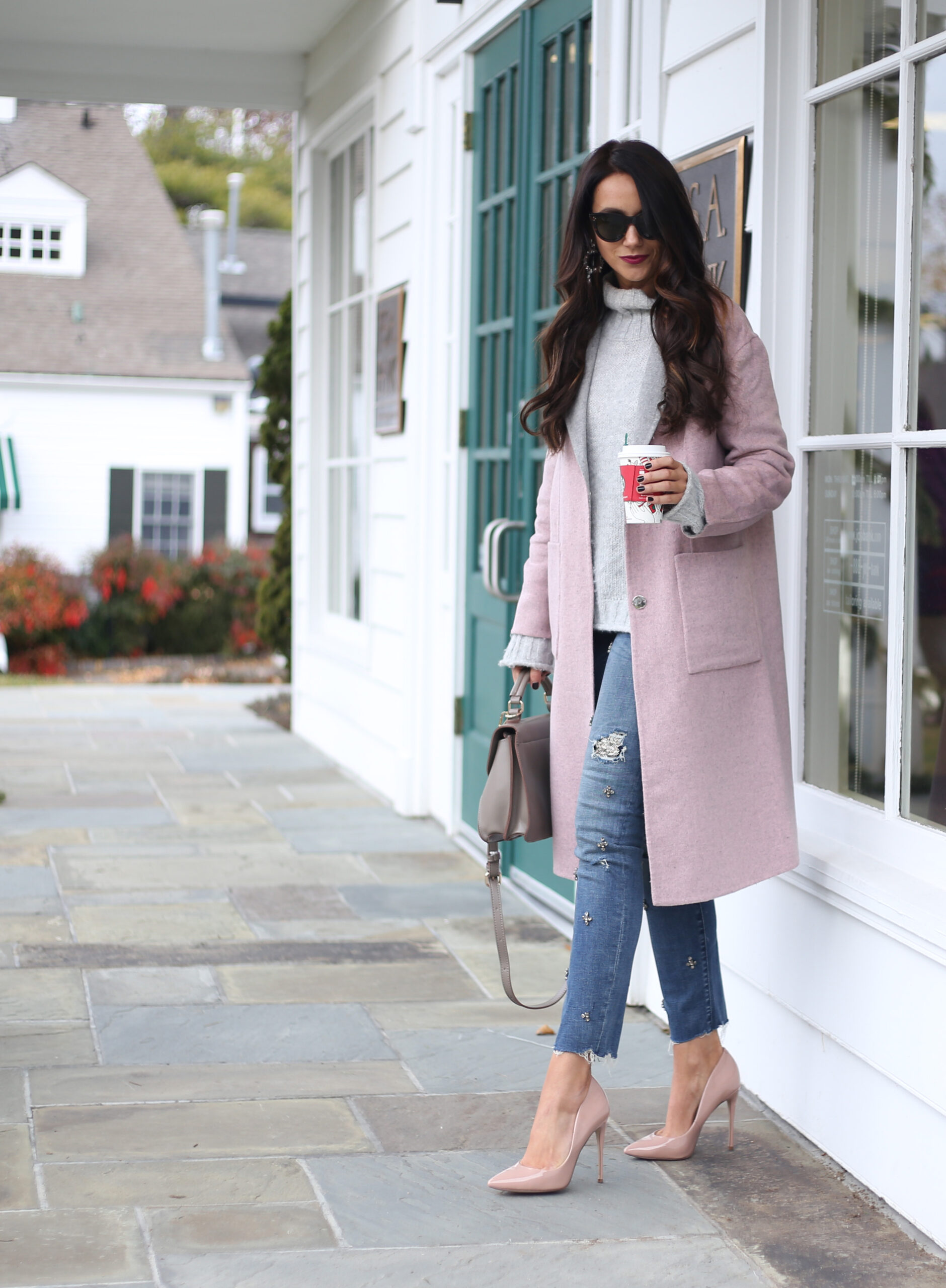 anna monteiro of blushing rose style wearing pink and grey combo in long coat and blush patent leather pumps