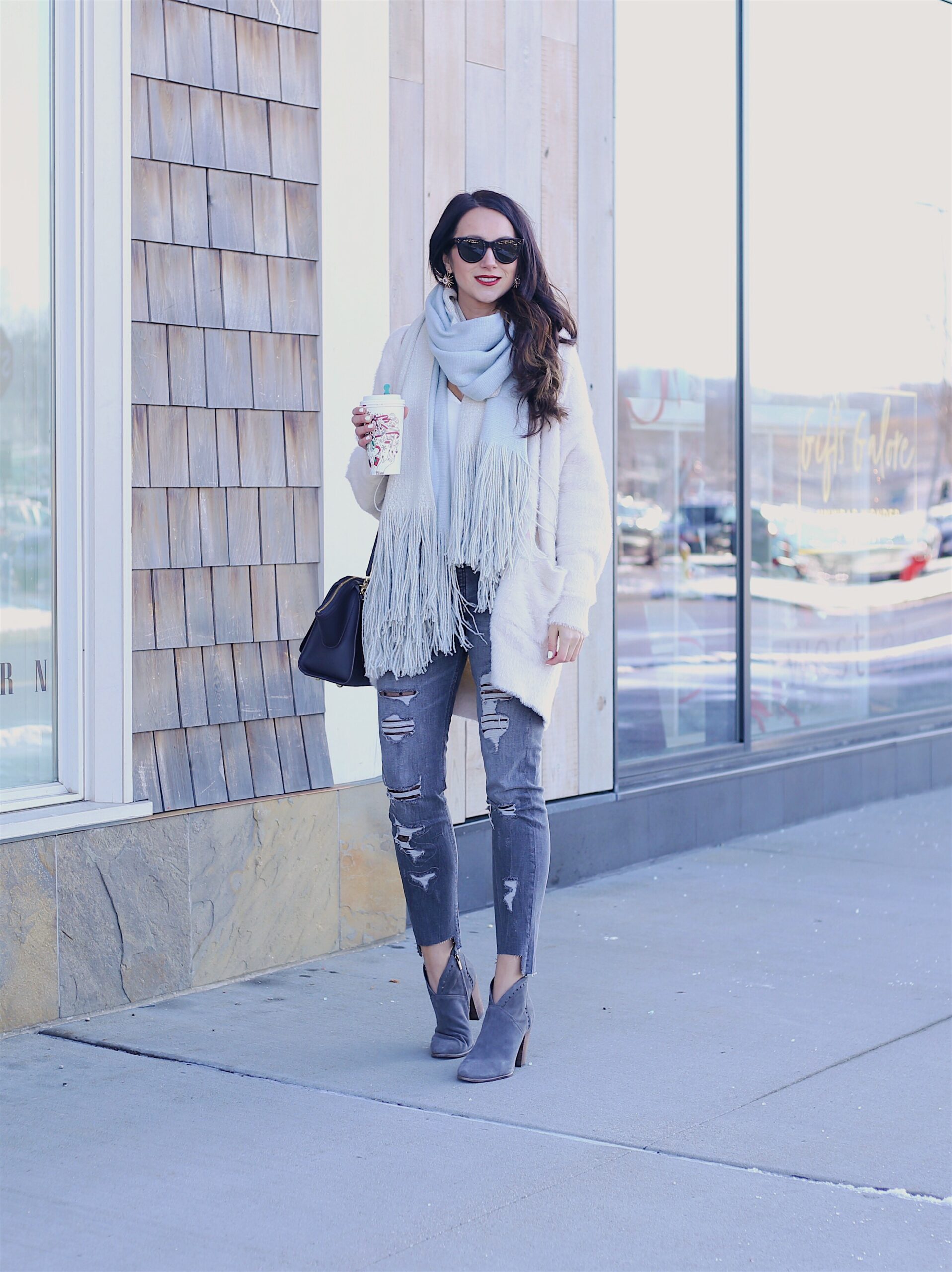 cozy winter layers white cardigan and fringe scarf