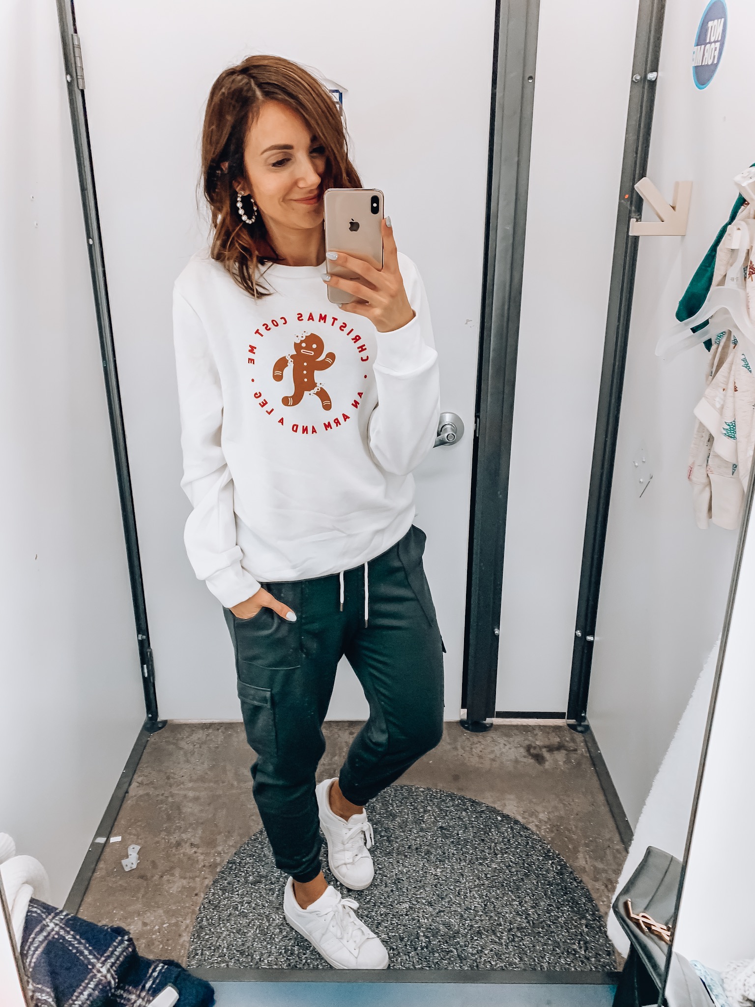 Woman wearing graphic christmas tee and joggers