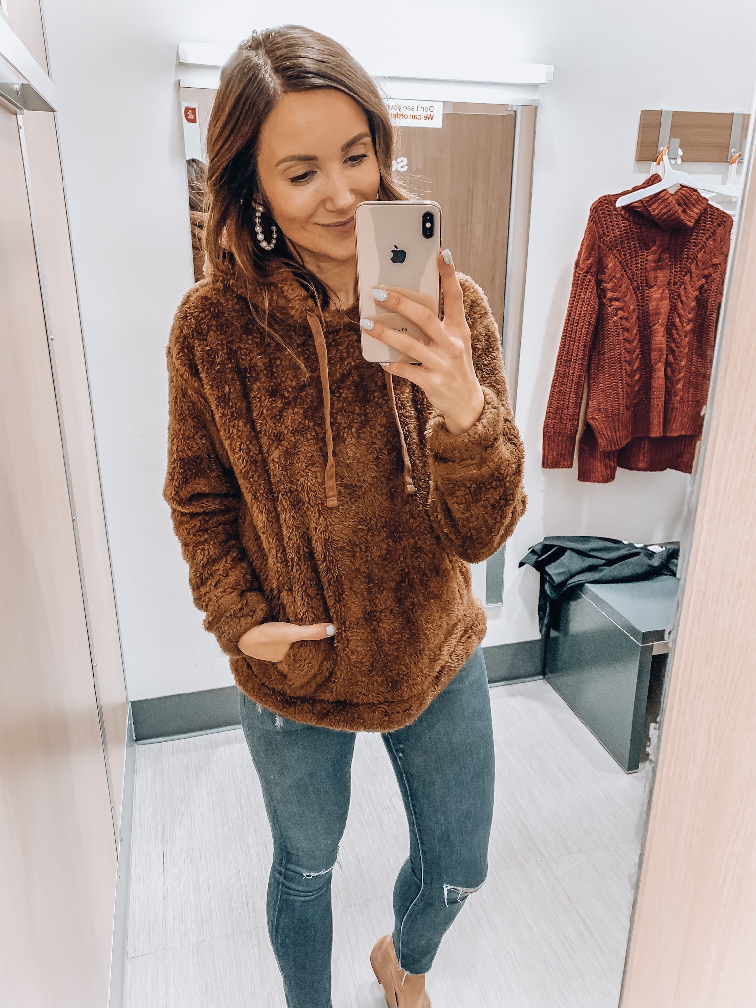 Woman wearing brown sherpa from Target