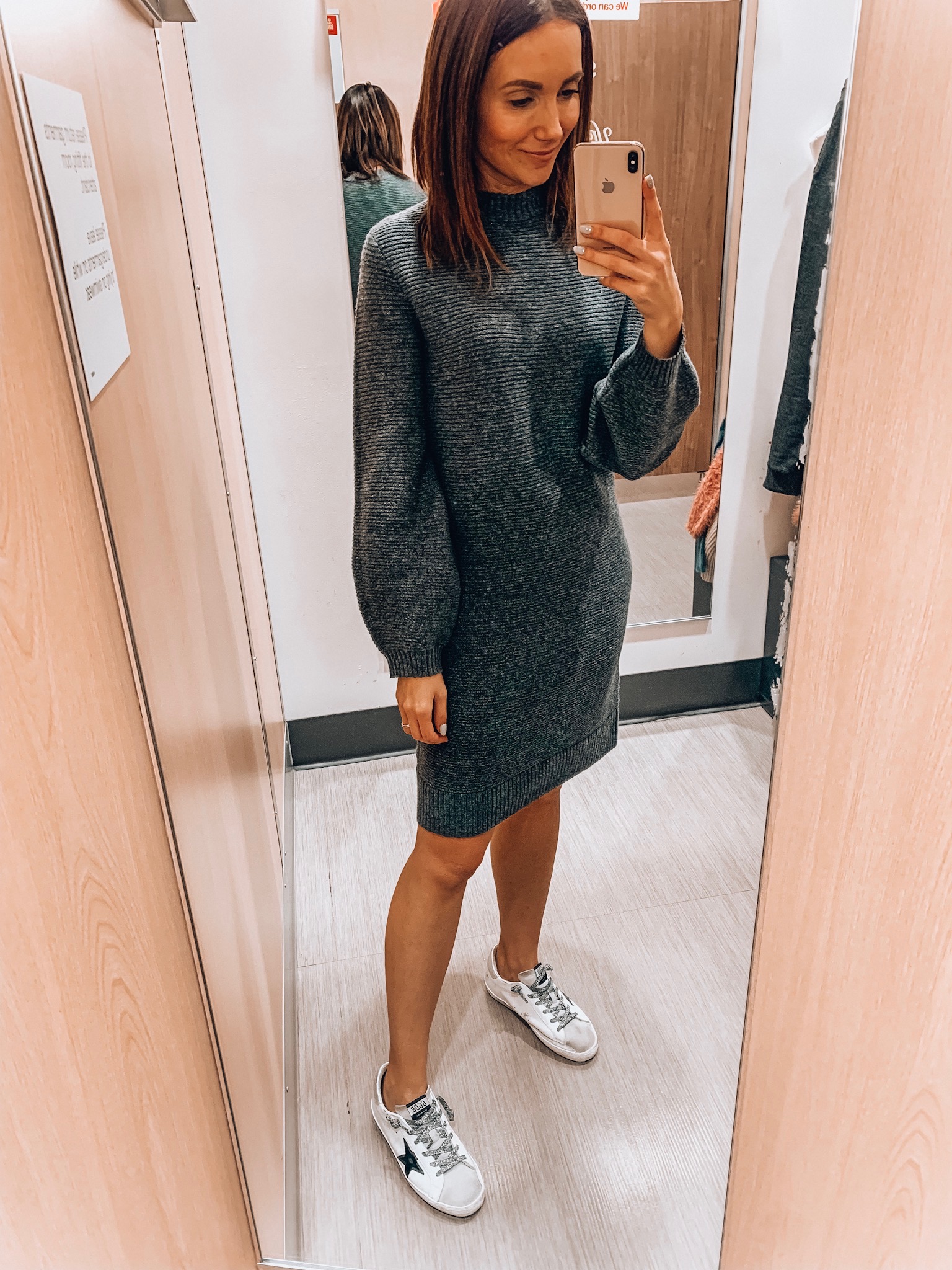 Woman wearing ribbed knit sweater dress