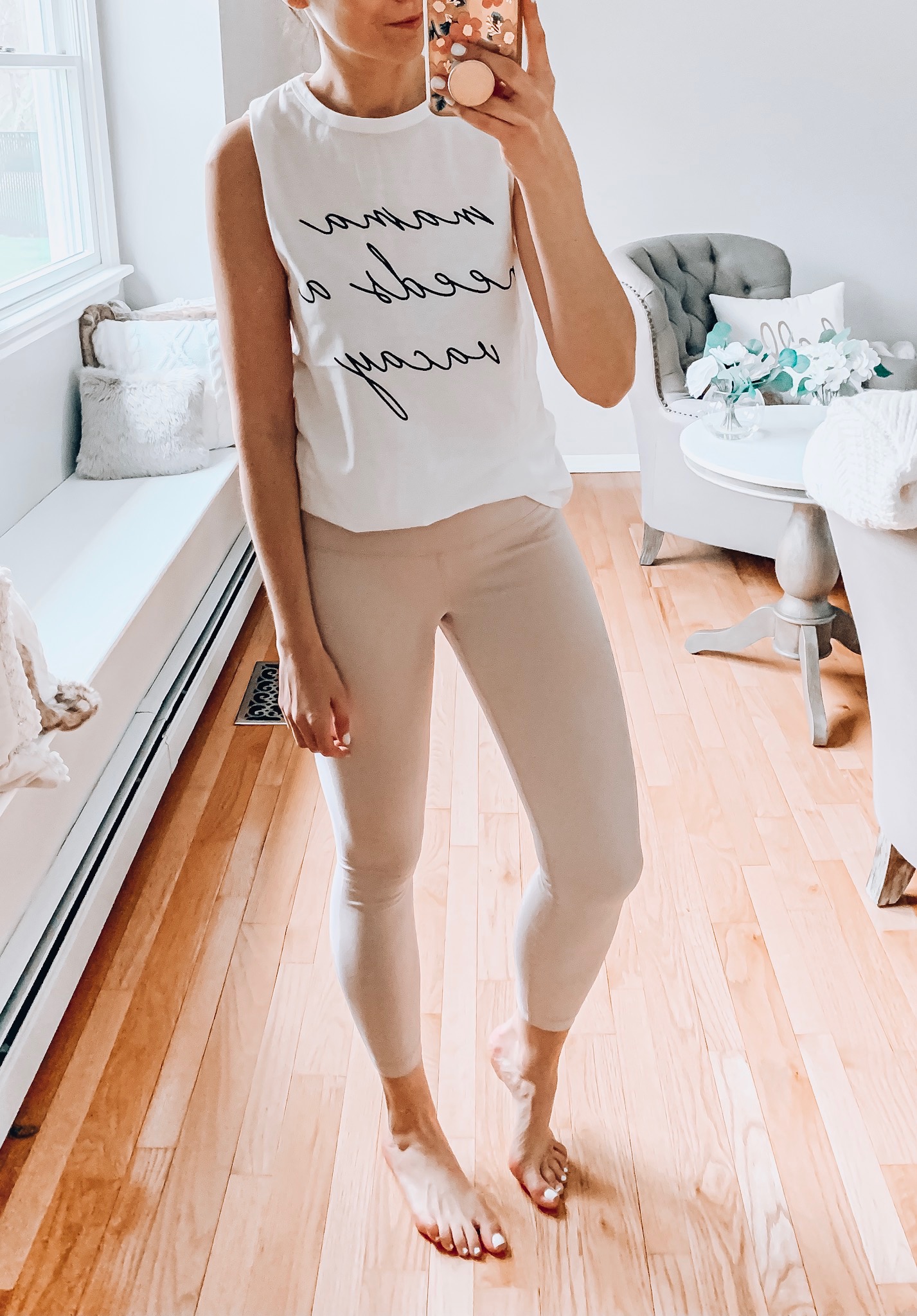 Woman wearing tank and leggings