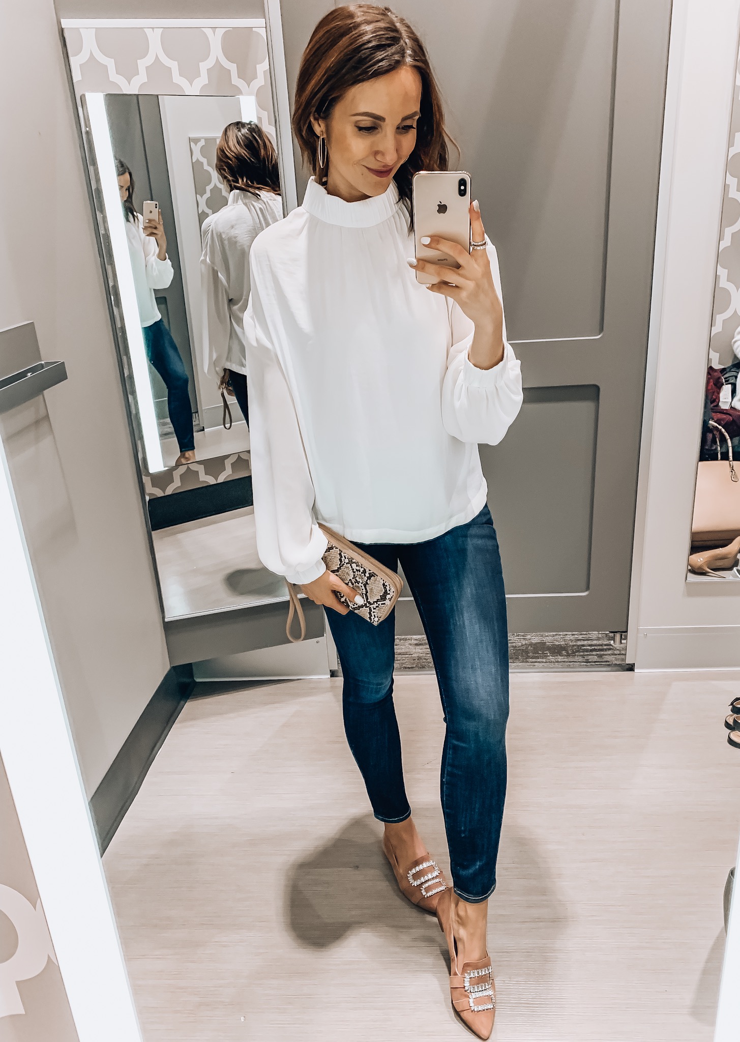 woman wearing white blouse with jeans, casual style