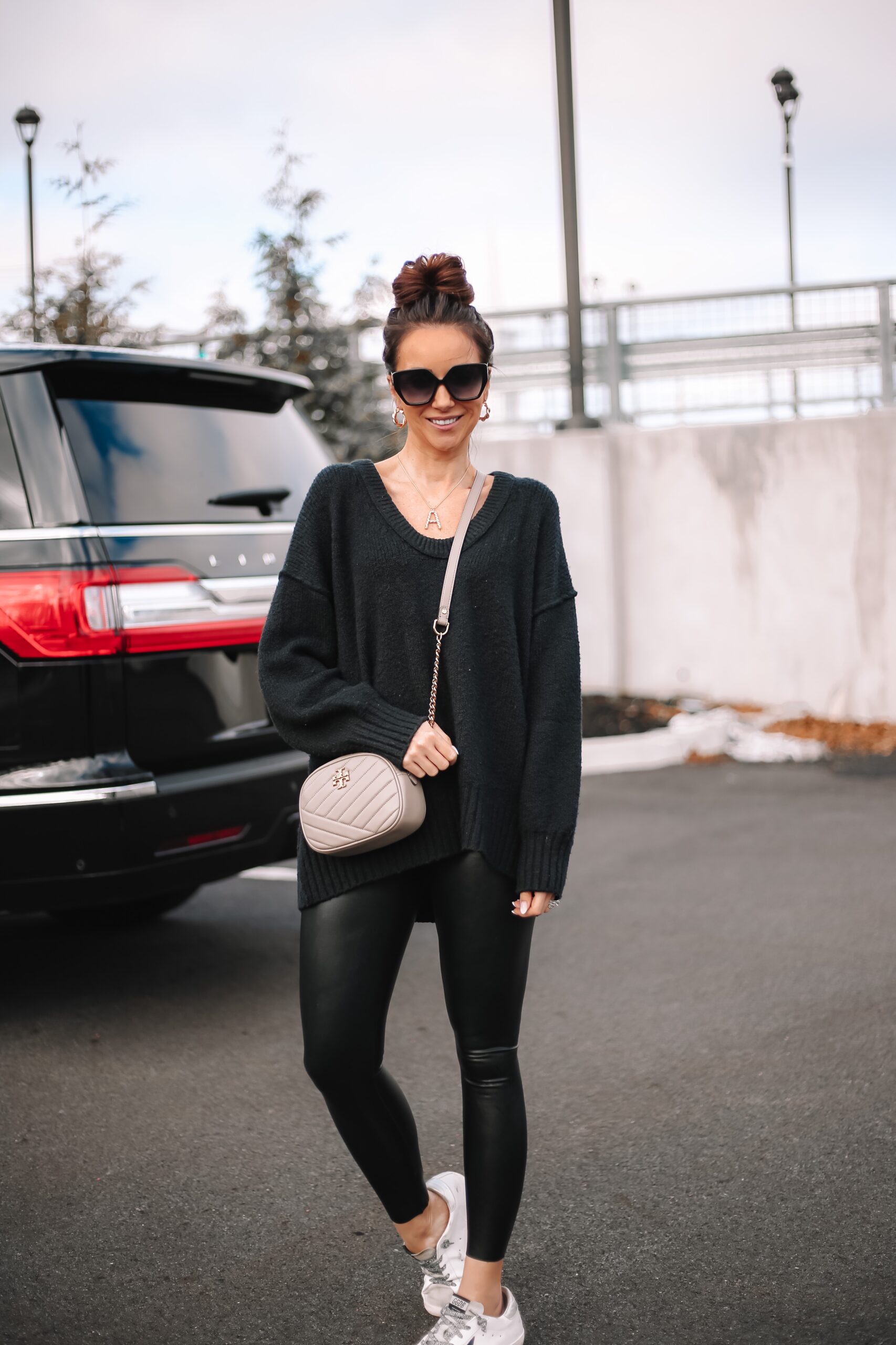 free people sweater, faux leather leggings