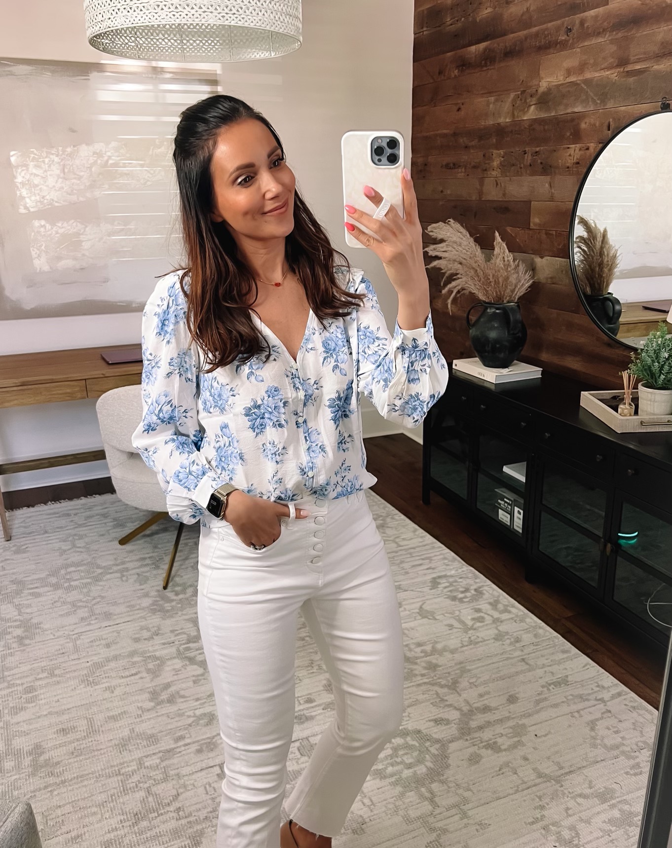 floral blouse and white jeans