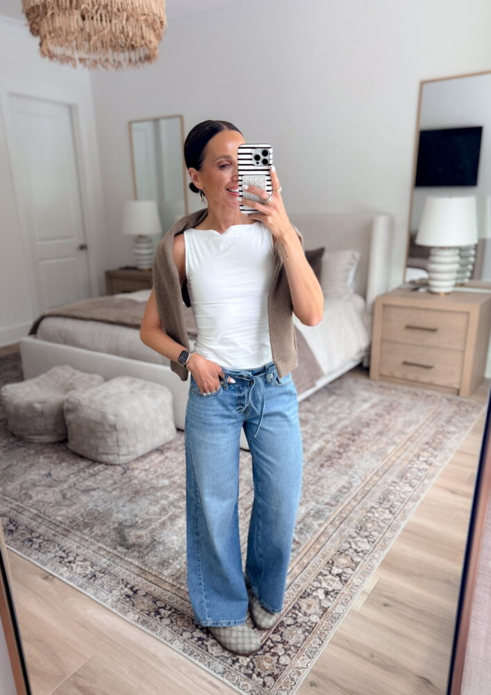 wide leg jeans, high waisted jeans, tie waist jeans, light wash denim, casual outfit, classic white tank top, sleeveless top, neutral cardigan, sweater over shoulders, everyday style, casual chic outfit, Walmart fashion find, affordable denim, stylish mom outfit, tall girl approved jeans, cozy bedroom mirror selfie, neutral home decor, modern bedroom aesthetic, layered casual look, minimal jewelry, smart watch accessory, casual weekend outfit, versatile jeans outfit, effortless style, fashion blogger outfit